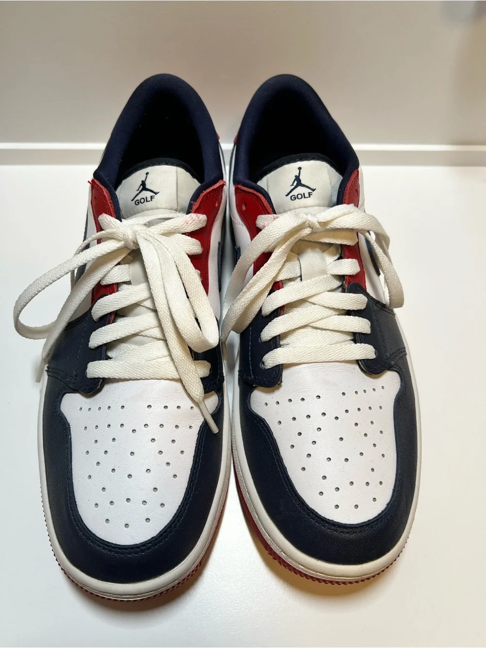 Nike Low-Top Sneakers in White, Red, and Navy